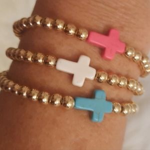 Gold Beaded Bracelet with Pink Cross Stone Decor